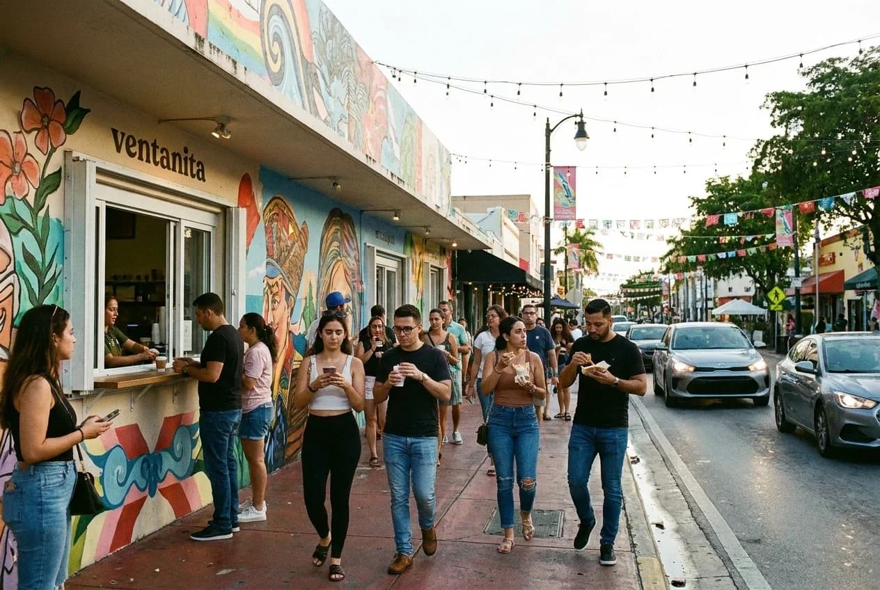 Pedestrians on Calle Ocho during Viernes Culturales street festival in Little Havana