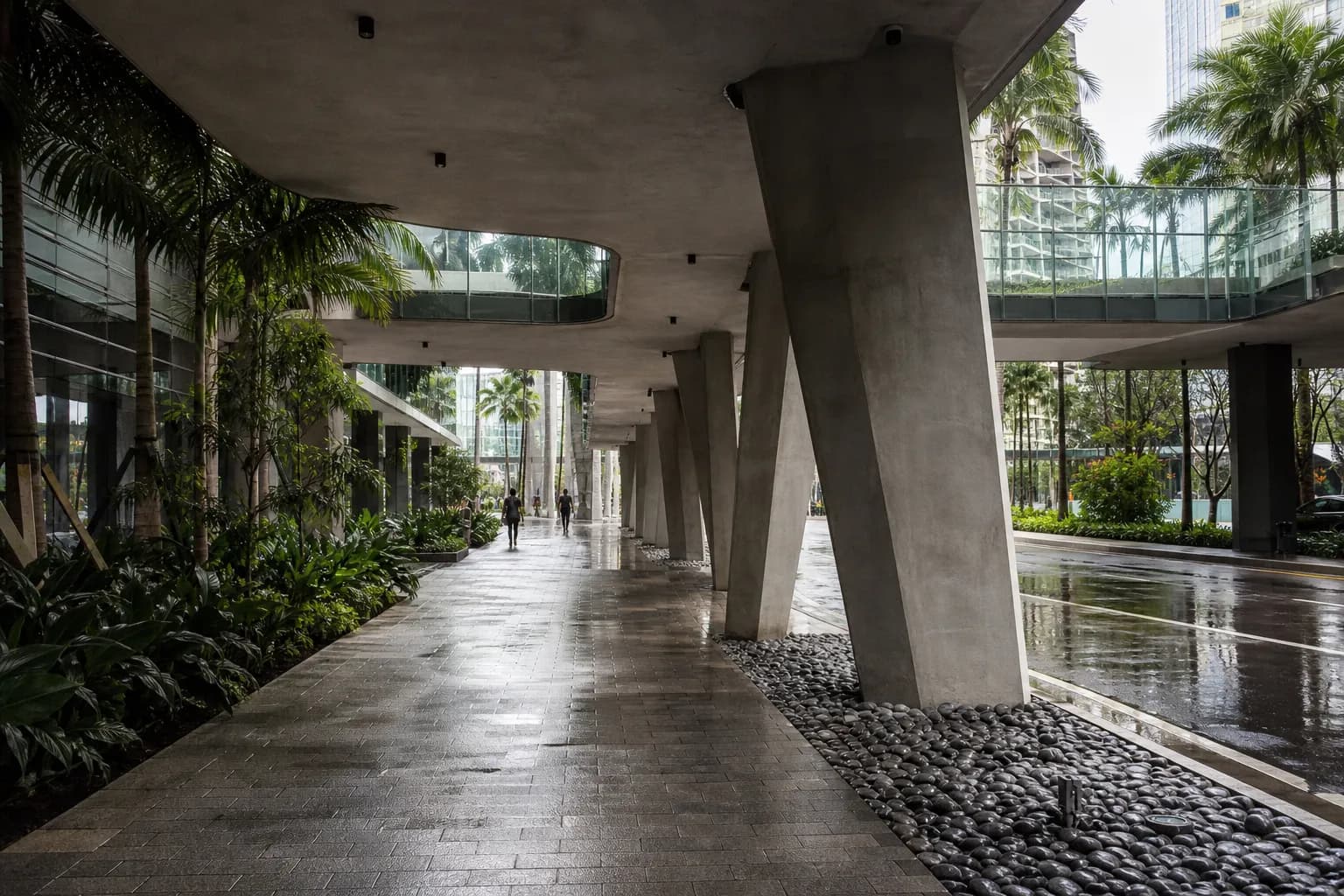 Covered Miami pedestrian connection with wet streets after rain