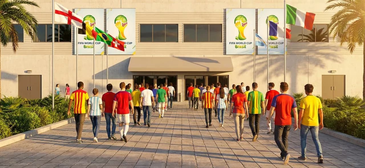 Fans in colorful soccer jerseys walking across a sunny stadium plaza toward the entrance, warm afternoon light, festive but not crowded