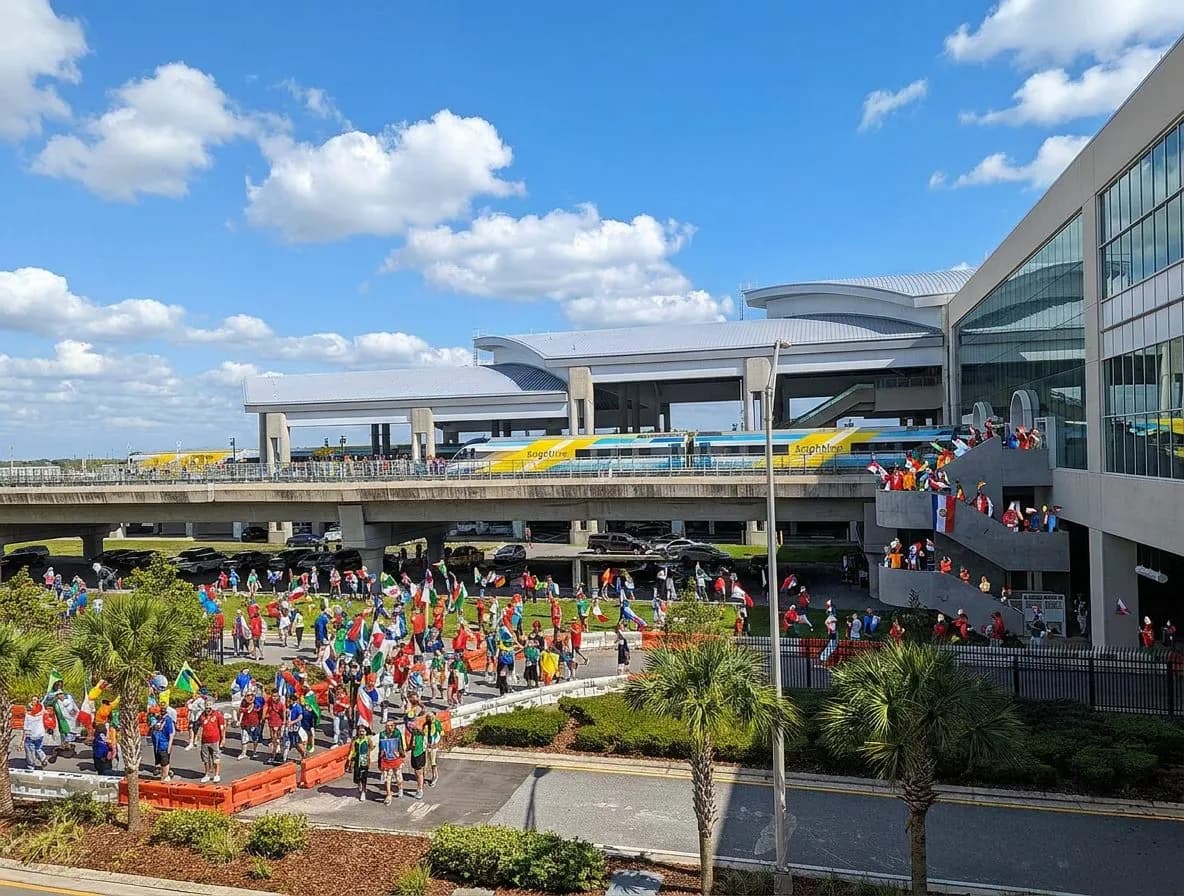 A sleek Brightline train gleaming under Florida sunshine at a modern station platform, travelers with colorful jerseys and scarves boarding in bright daylight