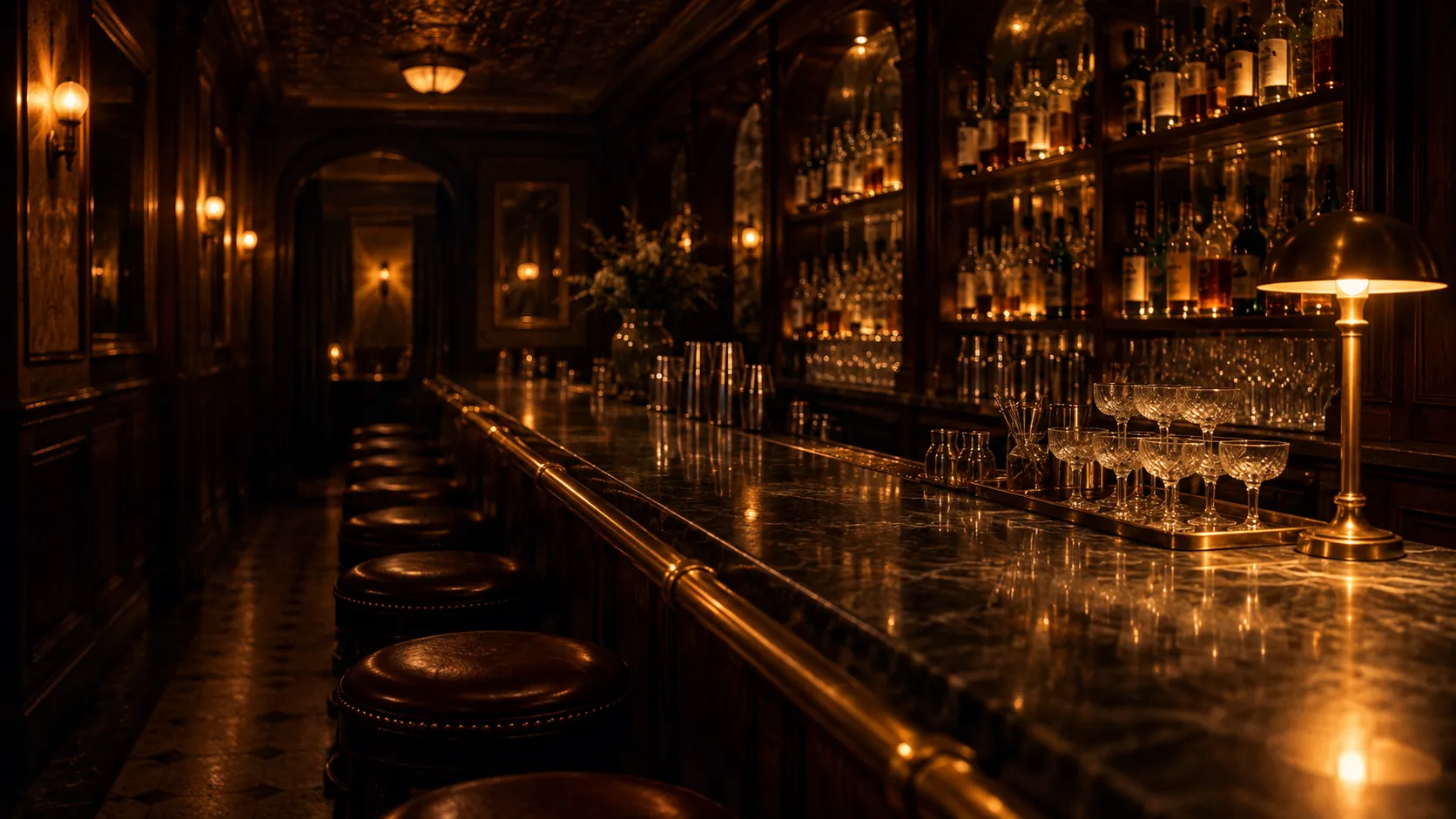 A dimly lit wood-panelled cocktail bar with a long counter and bottles behind