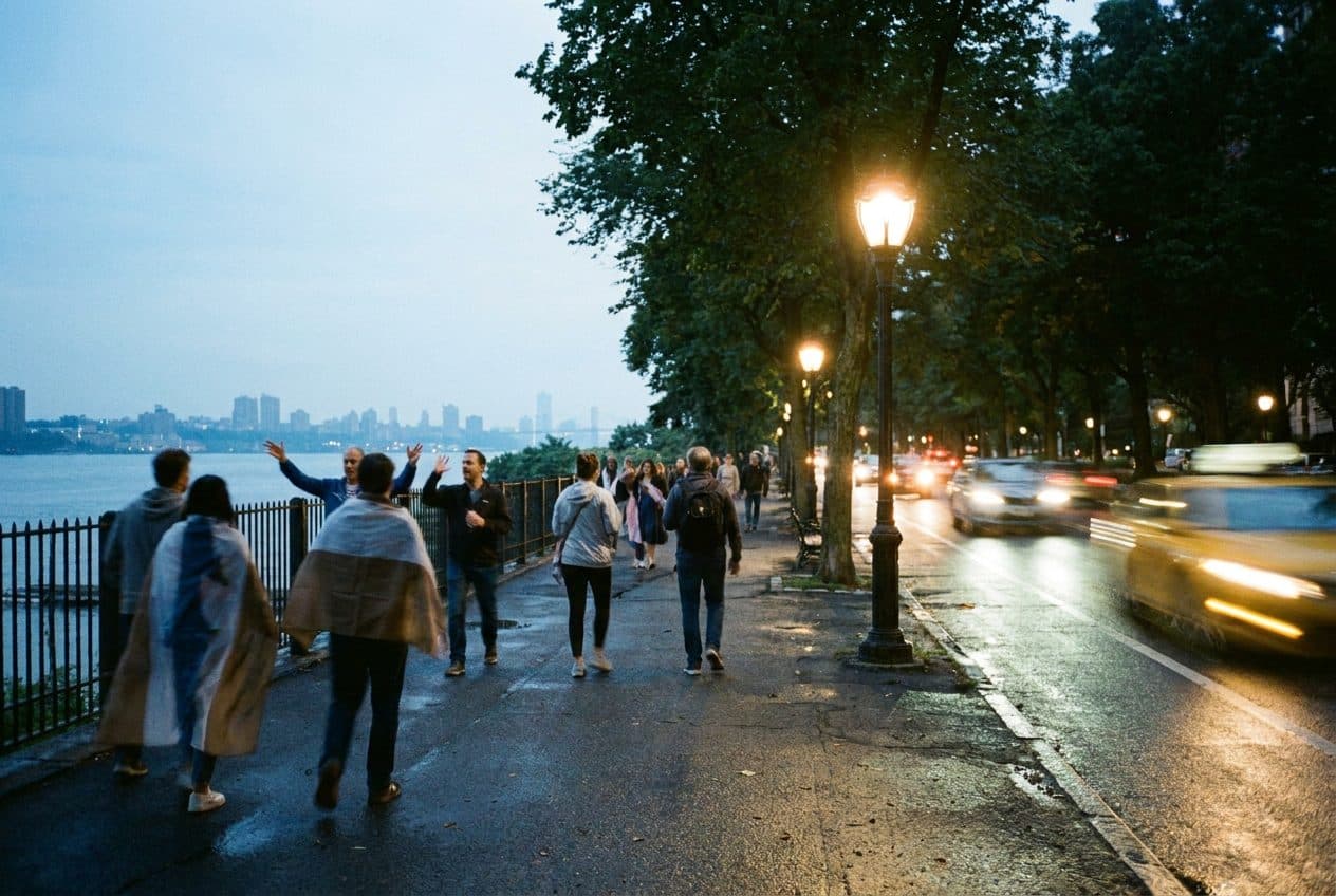 Harlem's Riverside Drive After France Plays: Slow Walks With Tricolor Scarves - scene