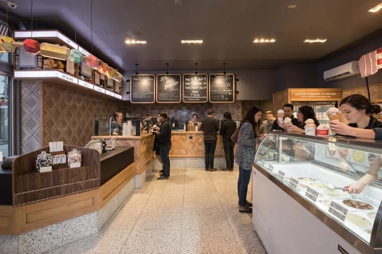 A casual line and counter scene at a popular Hayes Valley ice cream shop after dinner