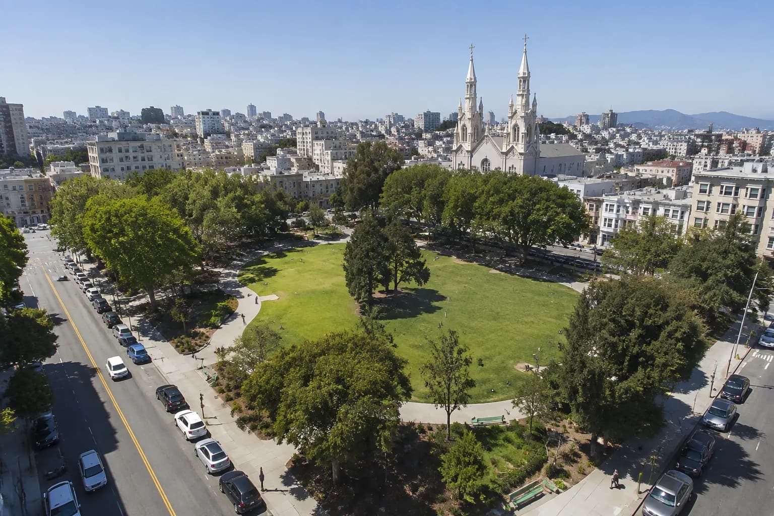 Elevated view of Washington Square Park in North Beach with church towers in background