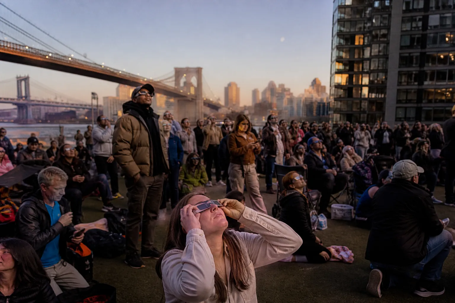 Distinct real-scene reference image for NYC: eclipse today: NYC weekend move with practical checks