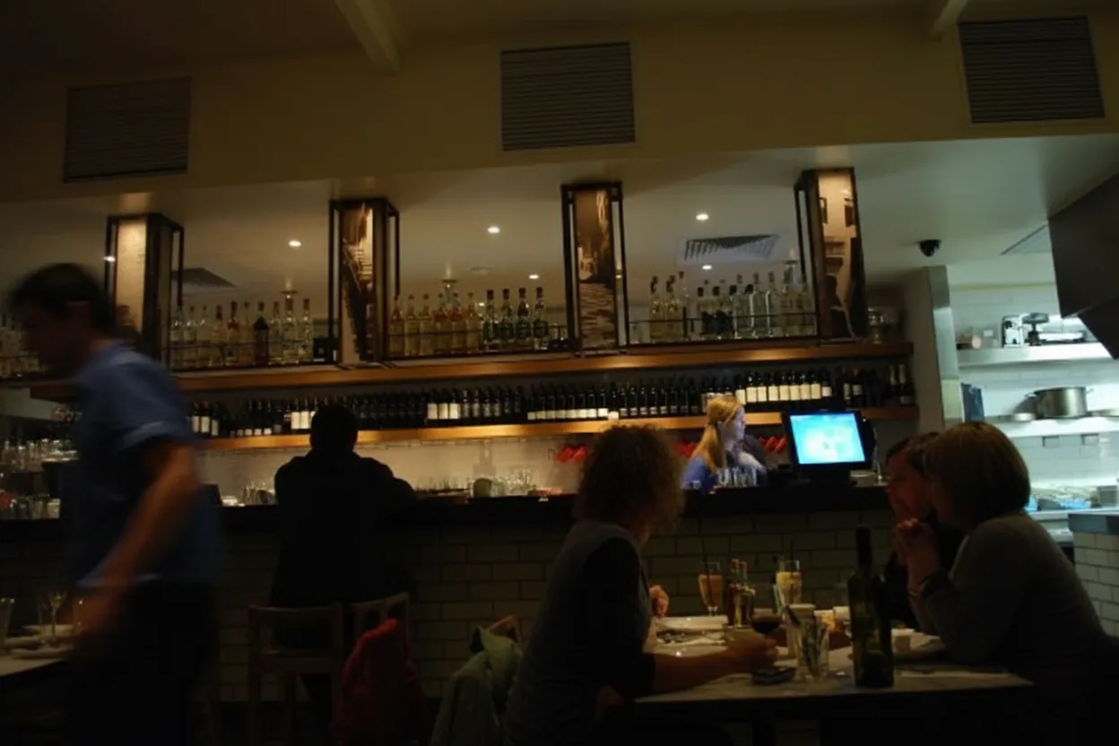 A late-night bar glowing warm after the show