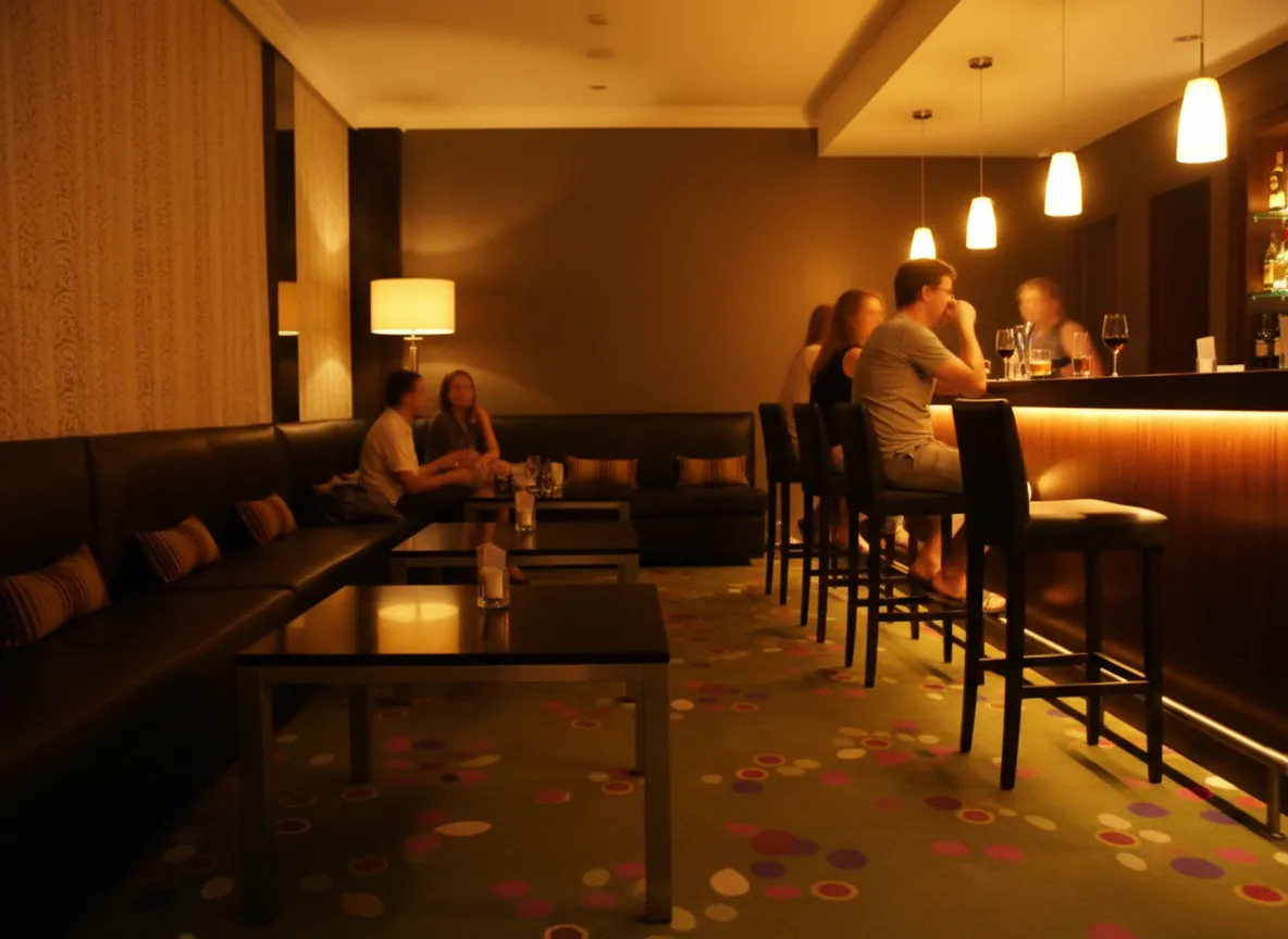 A warm late-night bar glowing after the show