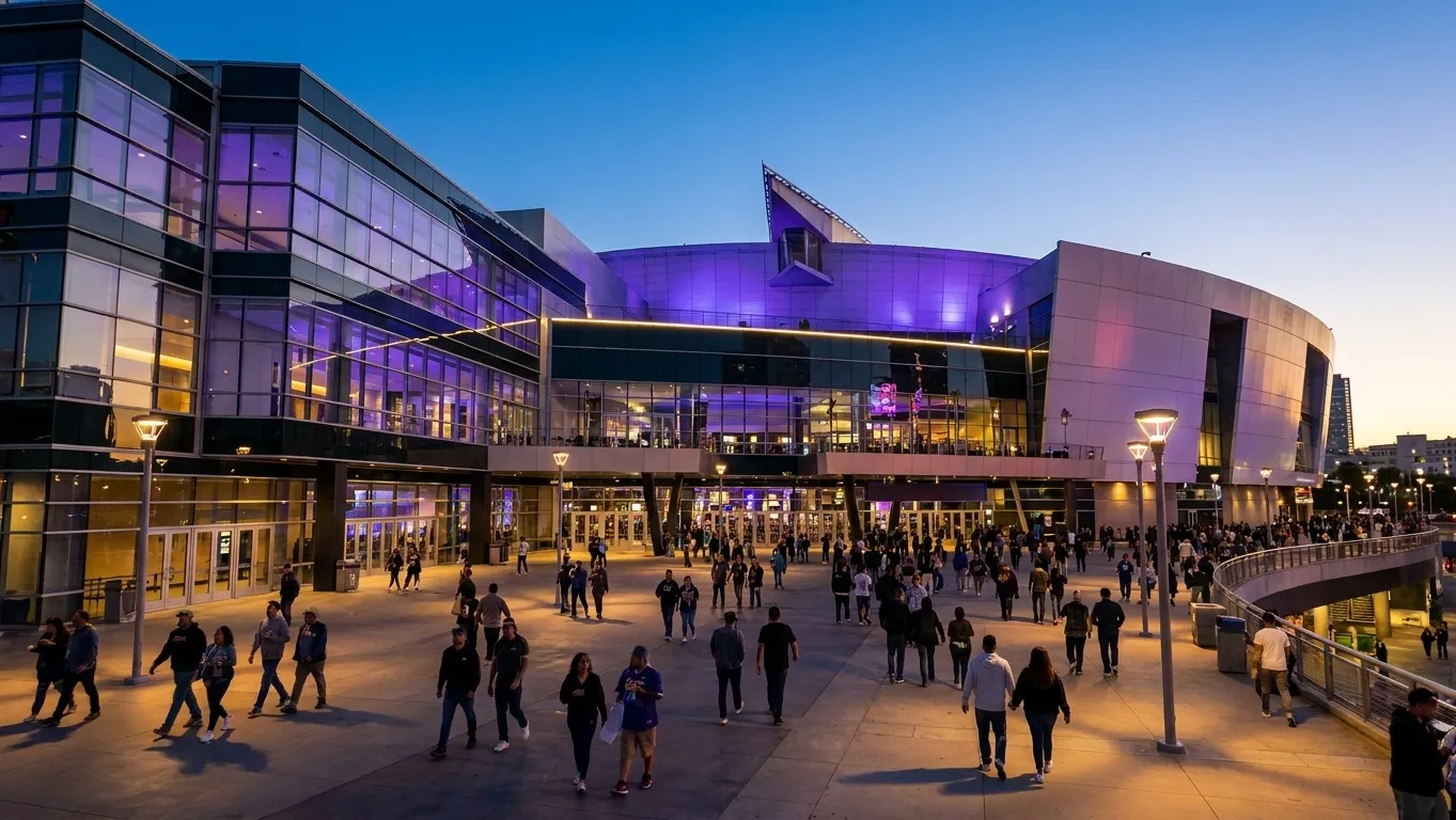 Wide view of Crypto.com Arena's main entrance and plaza in downtown Los Angeles during evening hours