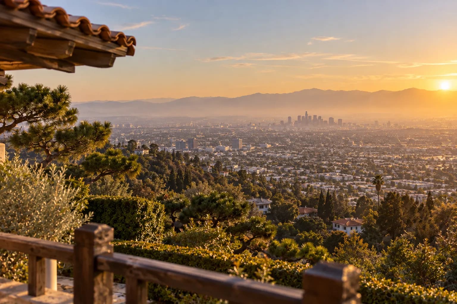 A hilltop building above Los Angeles with the city spread out below