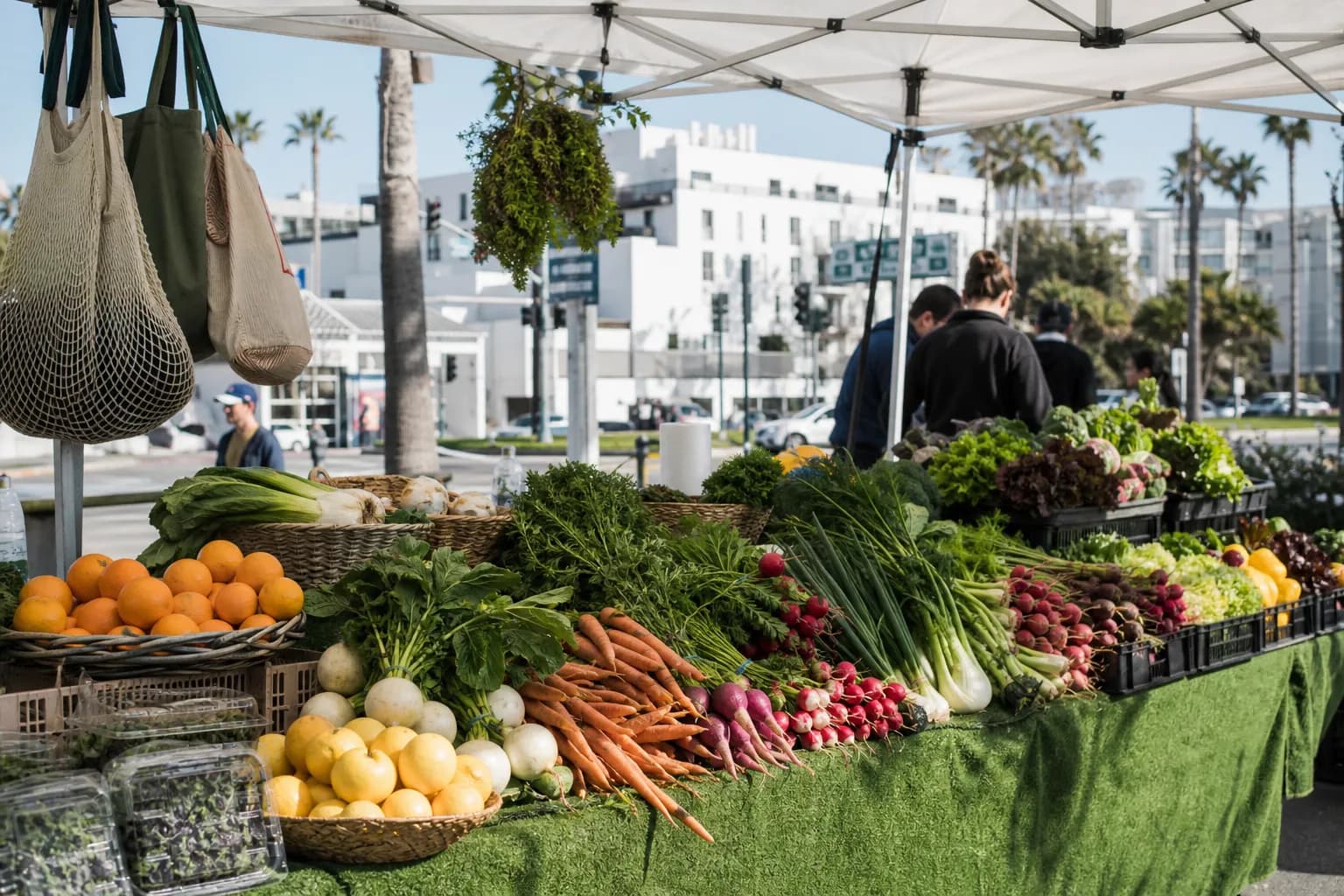A Westside farmers market produce stall with lunch-prep ingredients.