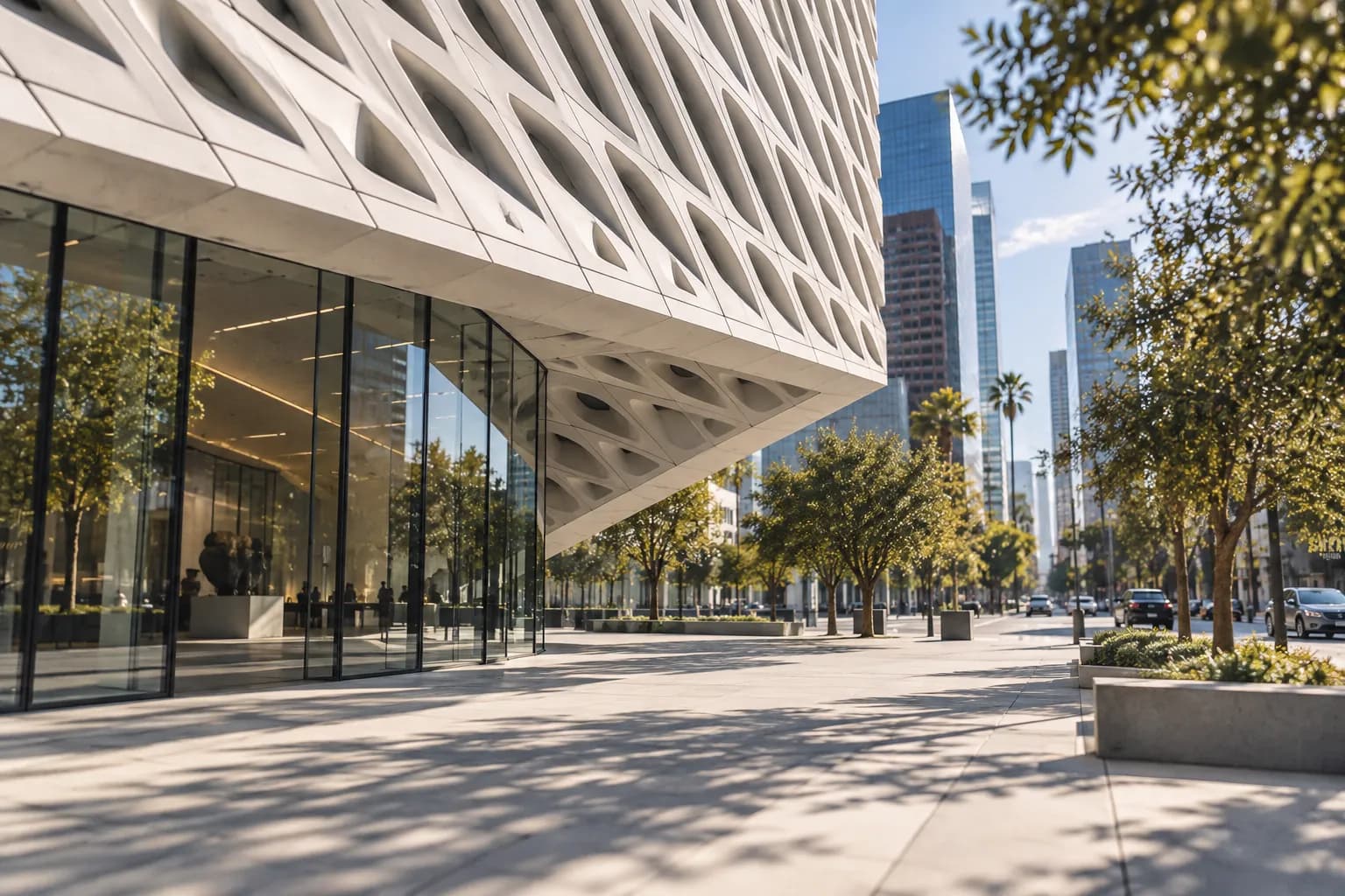 A white perforated museum facade on a downtown Los Angeles avenue