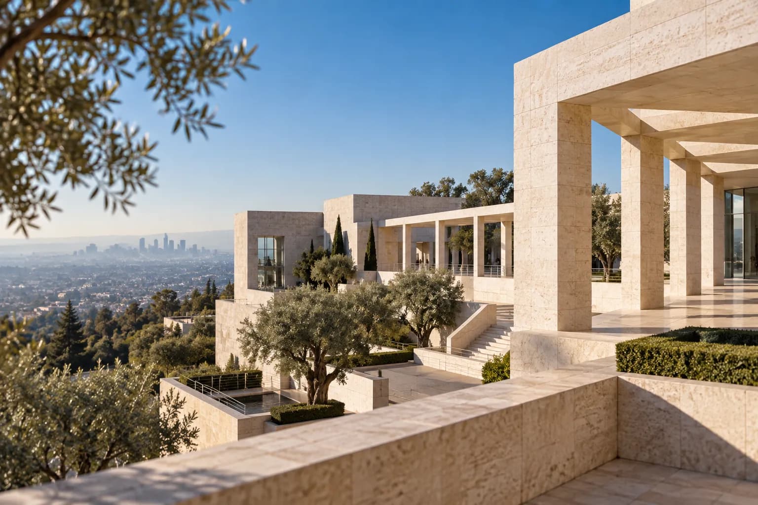 A travertine hilltop museum complex with gardens above a city