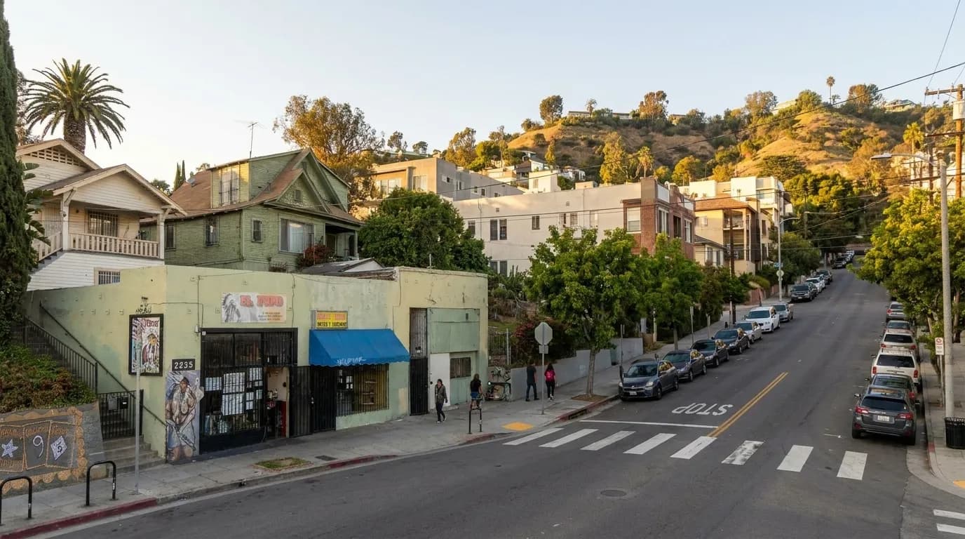 Sunset Boulevard in Echo Park, Los Angeles, showing the cafe-lined street and parked cars during afternoon light