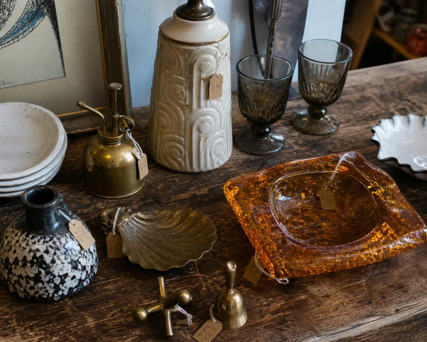 Tabletop of odd vintage objects and retro decor finds
