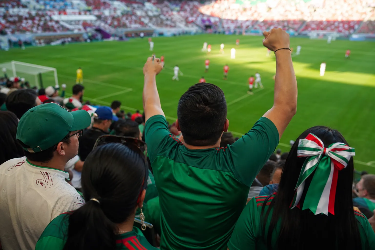 Group chat planning scene for Mexico's next World Cup match