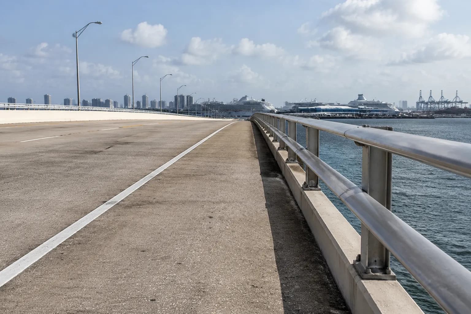 MacArthur Causeway roadway looking toward Port of Miami on a clear afternoon