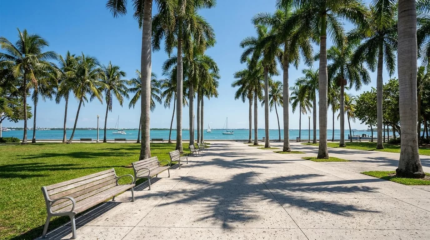 Bayfront Park in Downtown Miami with palm trees, walking paths, and Biscayne Bay in the background