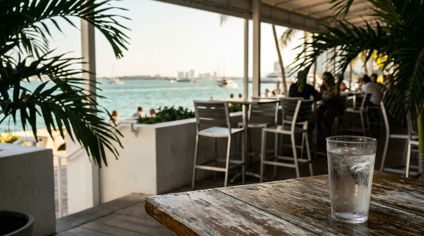 Covered terrace seating overlooking Biscayne Bay on Brickell Avenue in Miami