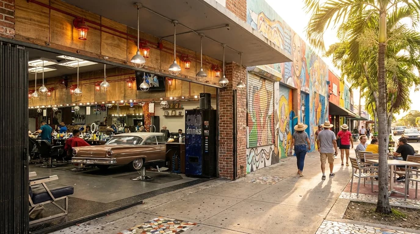 Street view of Calle Ocho in Little Havana, Miami, with colorful storefronts and palm trees