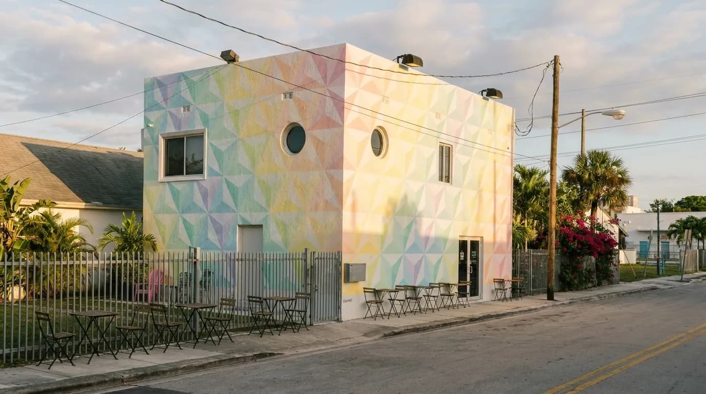 Morning light on Wynwood warehouse storefronts with colorful street art