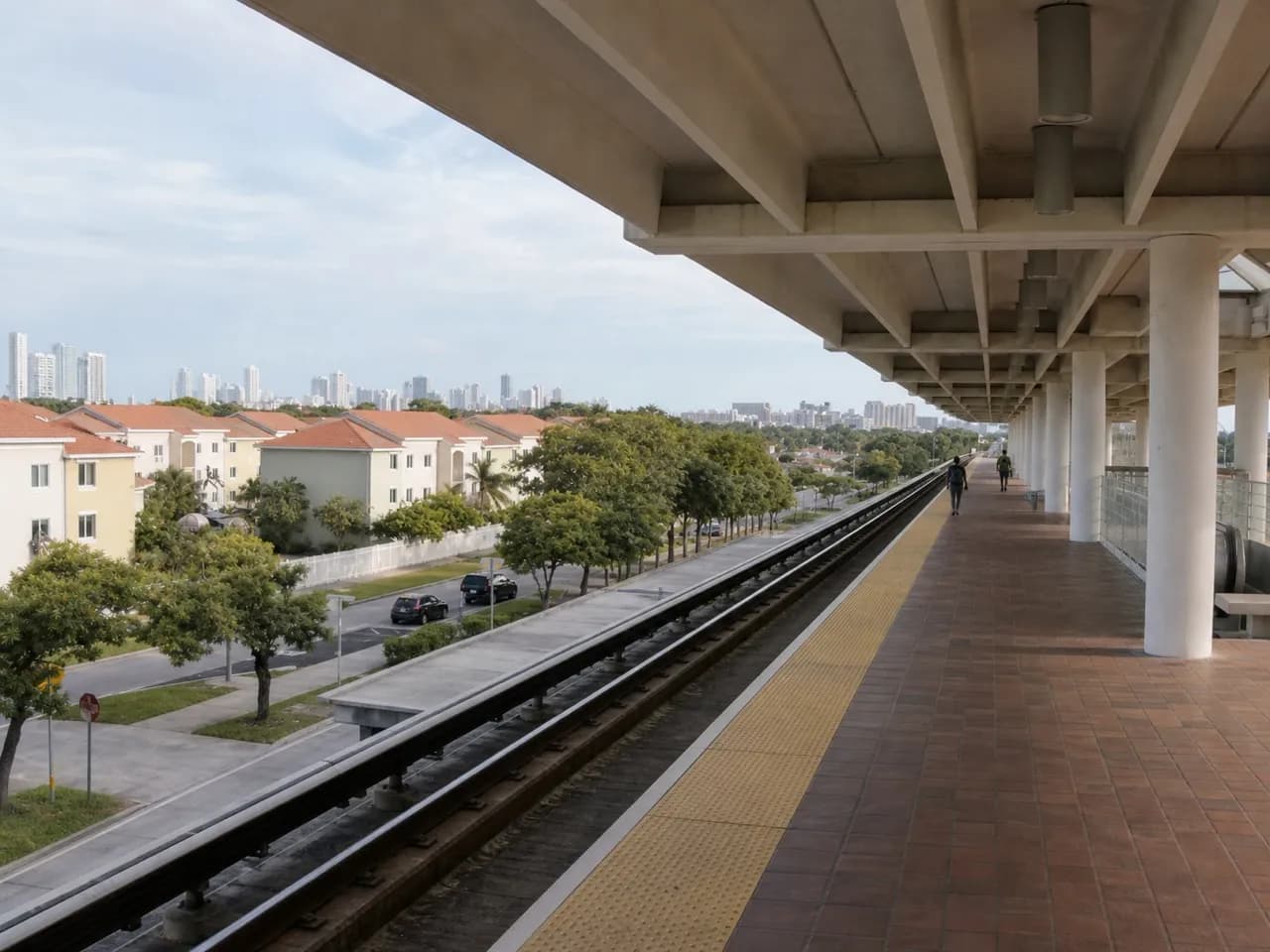 Elevated Metrorail station platform above an Allapattah street