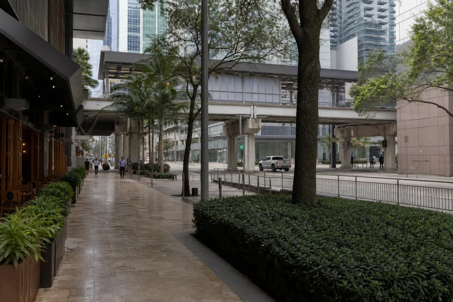 Metromover and sidewalk scene near Brickell before the morning rush