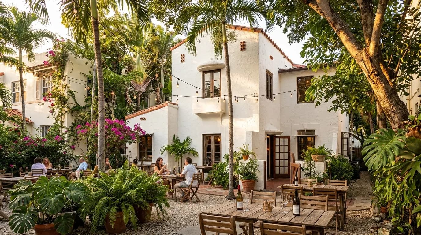 Lagniappe House exterior with outdoor seating in Miami