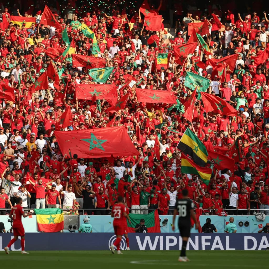 Morocco players pressing forward together in red jerseys during World Cup 2026