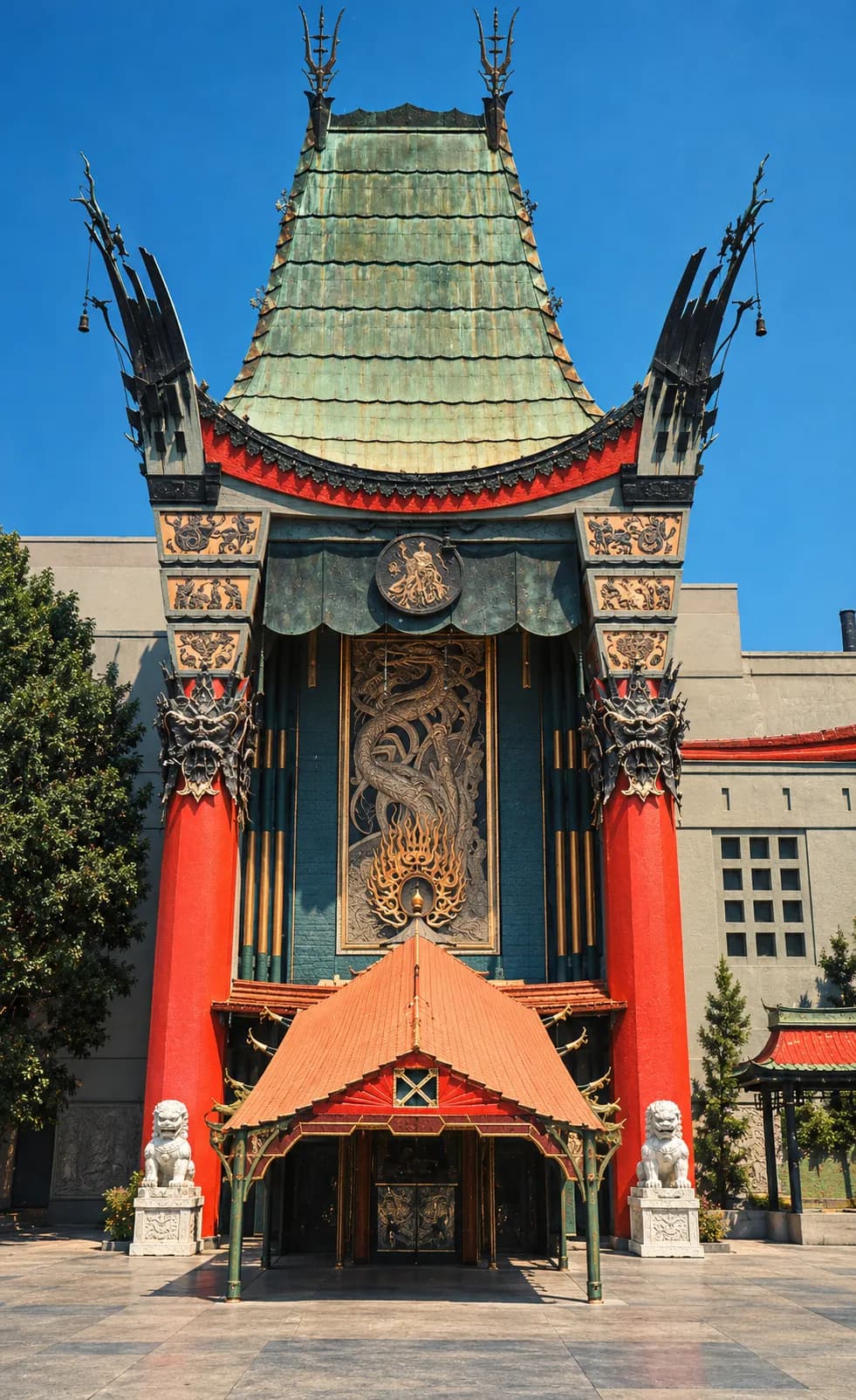 An ornate pagoda-style theatre facade with a tall red columned entrance