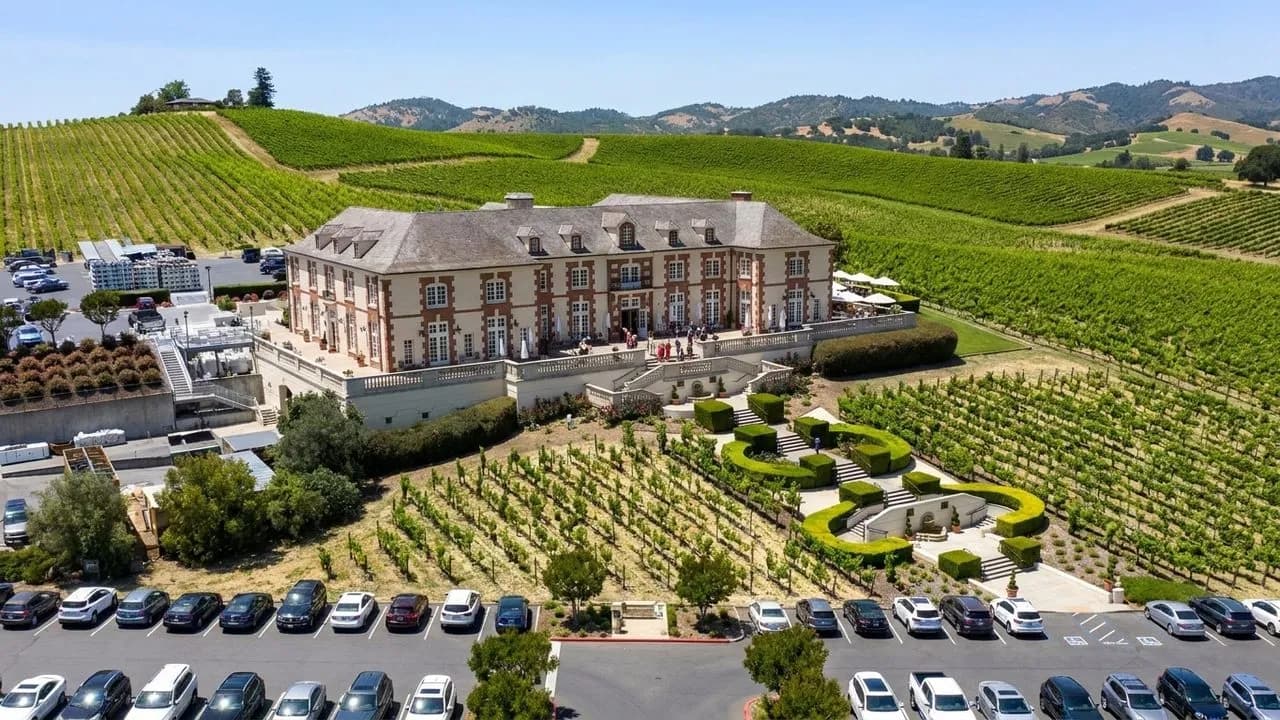 A hillside winery terrace above Napa vineyards