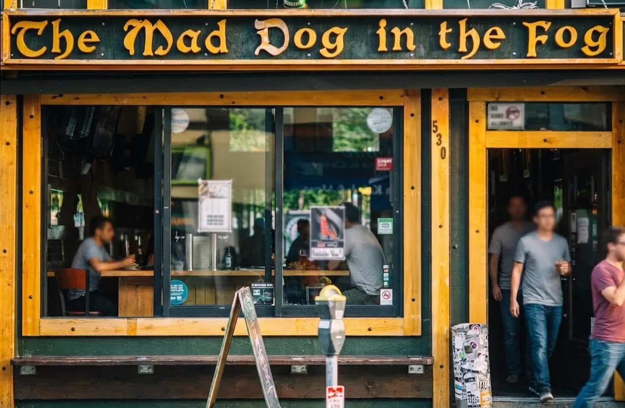 British pub exterior on Haight Street with dark green facade and large front windows