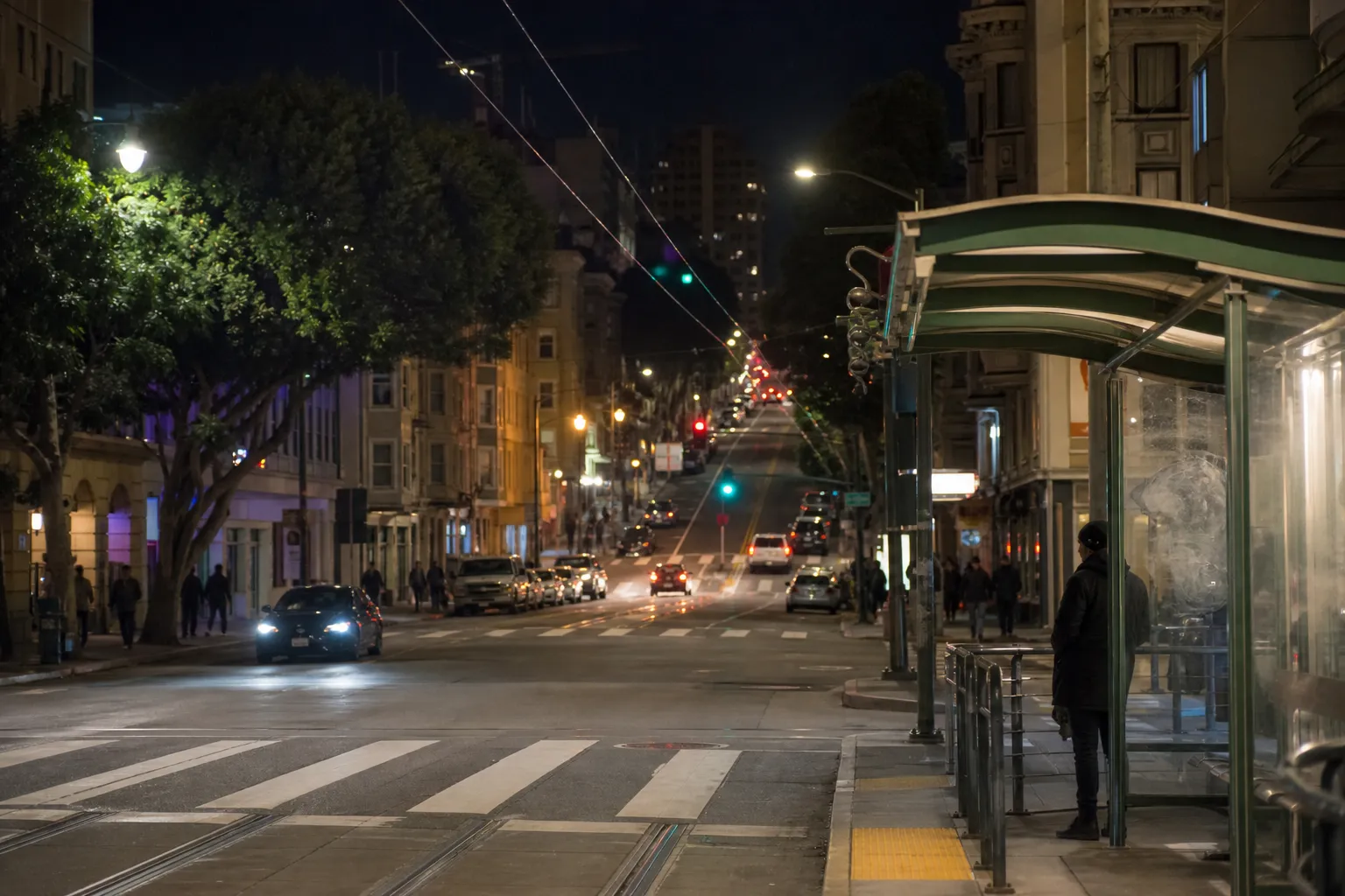 A San Francisco street in North Beach near a quiet wine bar at night