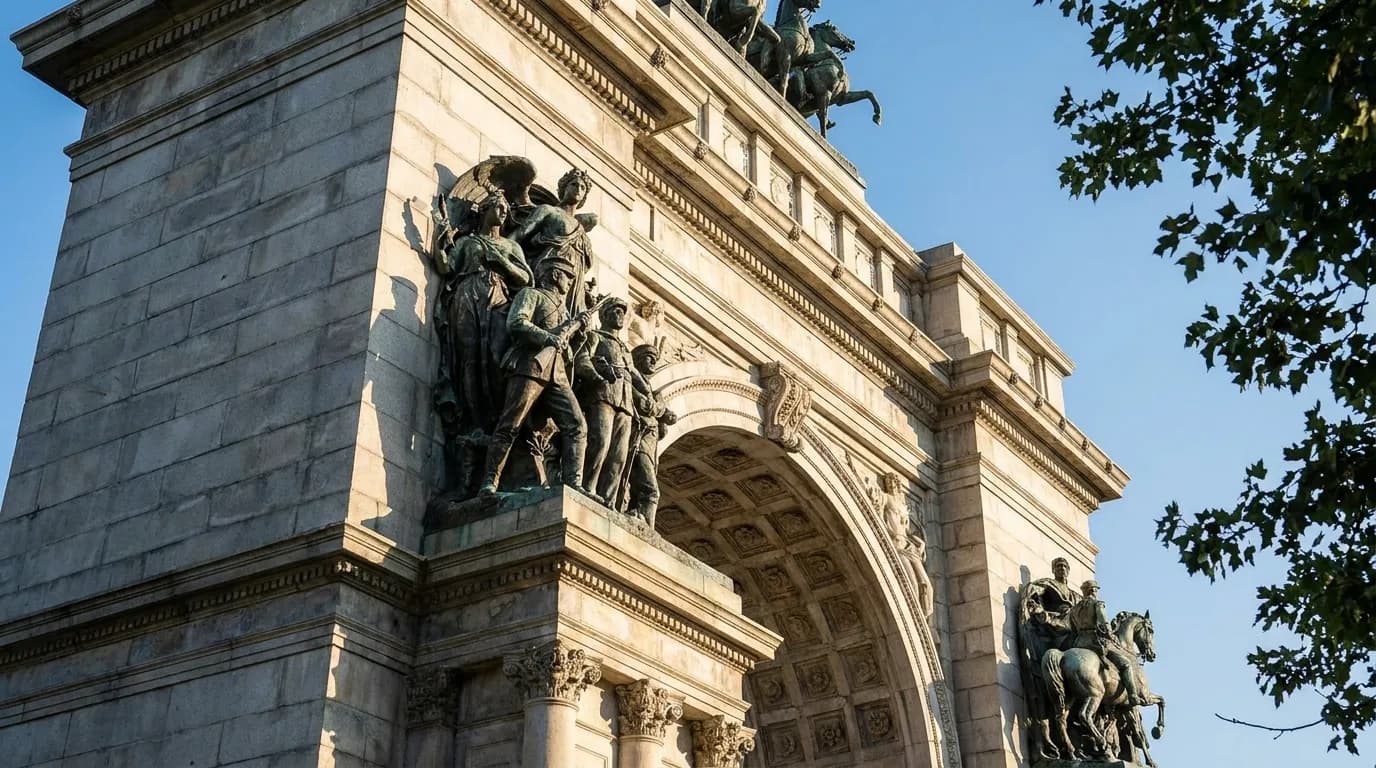 Detail of Soldiers' and Sailors' Arch at Grand Army Plaza showing carved stone and bronze in afternoon light