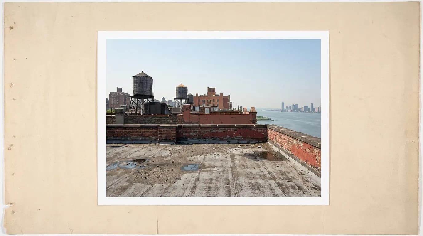Rooftop view from an Upper West Side apartment building showing the southern skyline and Hudson River