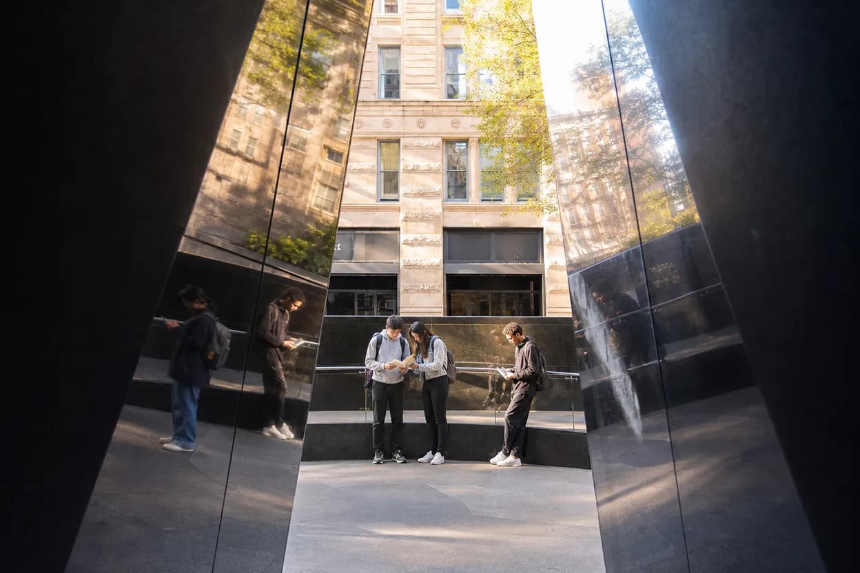 Reflective monument finish for a NYC back-to-school history route