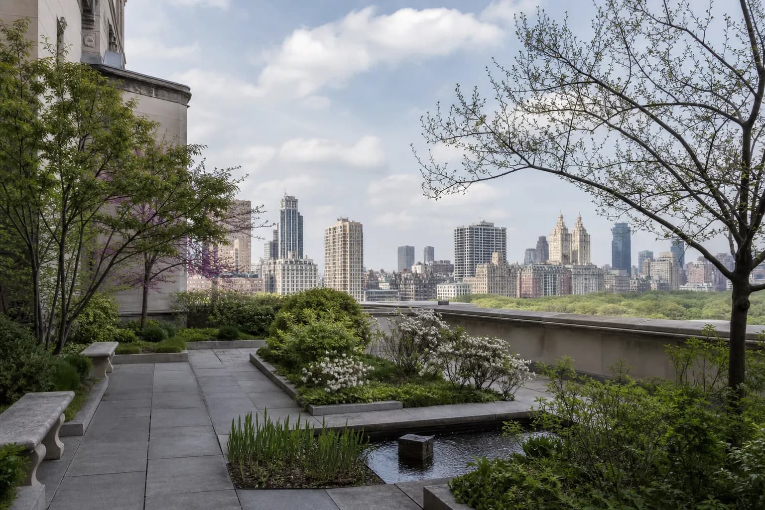 A calm rooftop garden on a Manhattan museum with skyline behind it