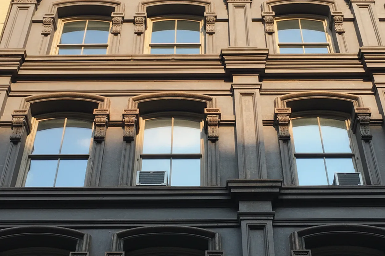 A close view of a decorative cast-iron facade