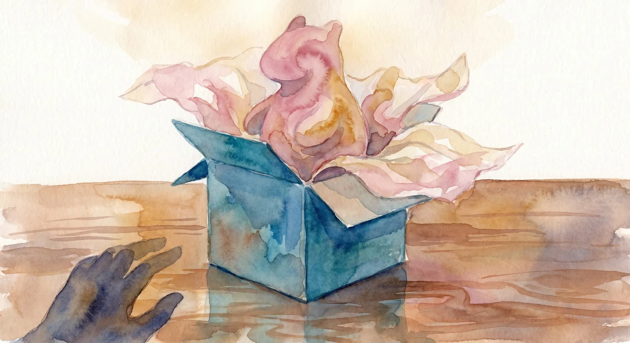 AI-generated watercolor: a single open blind box on a polished display surface, the box itself rendered as a pastel cobalt cardboard cube with a soft impressionistic abstract small figurine emerging — a tiny generic stylized creature shape in dusty pink and ochre, surrounded by crumpled tissue paper as soft washes, one hand silhouette in the corner just barely entering the frame in dark wash, warm soft top-down light