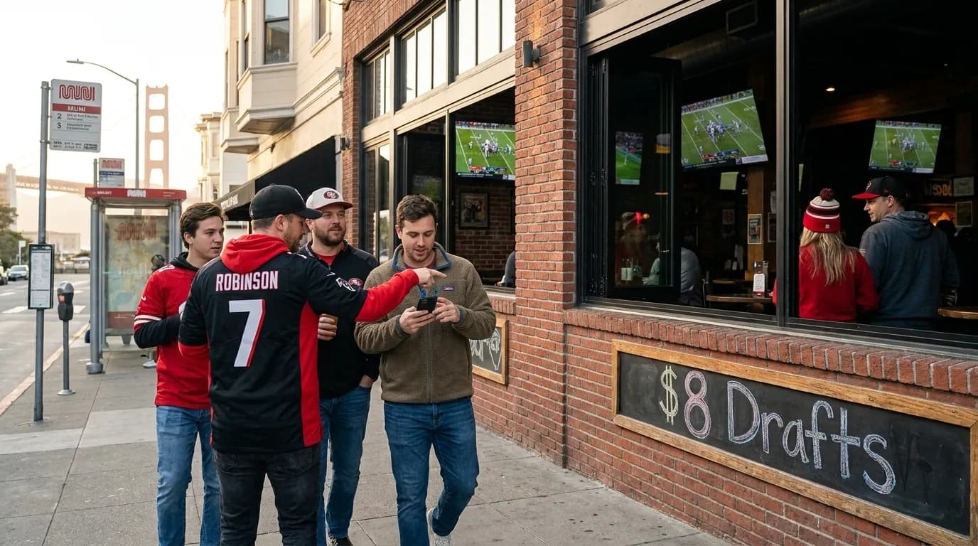 Sports fans watching NFL game on large screens in San Francisco sports bar with draft beer