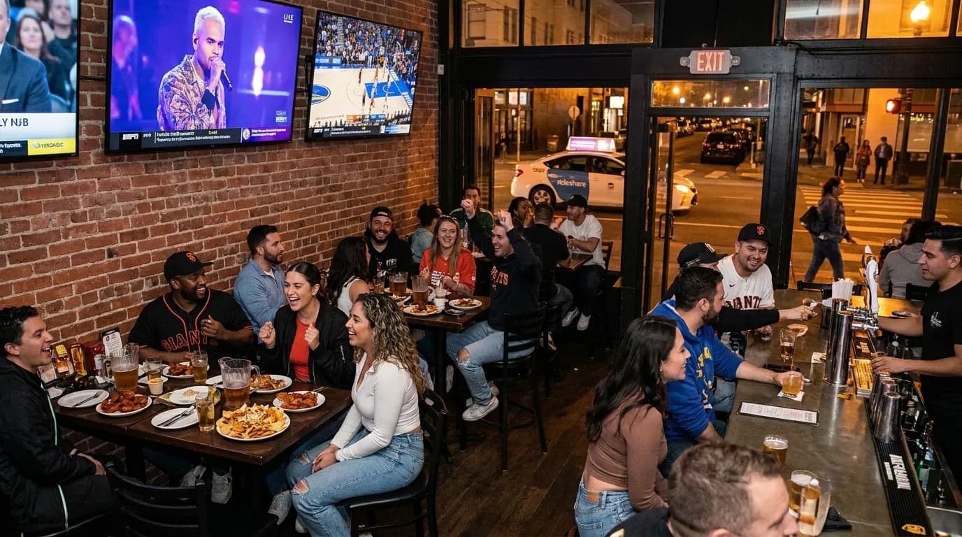 Sports bar interior showing dual-screen setup with sound system for music and sports viewing flexibility