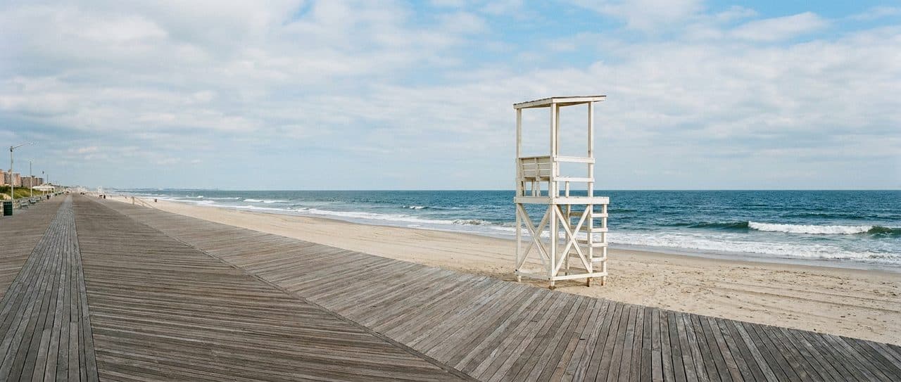 The Rockaway Boardwalk in September When the Crowds Disappear and the Atlantic Stays Warm - cover