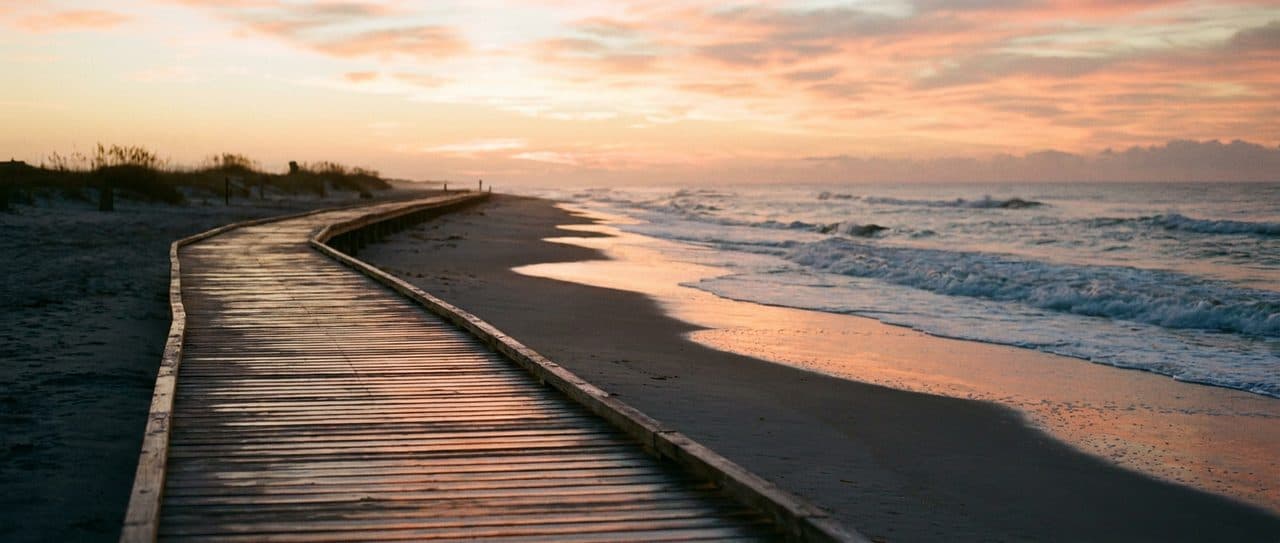 Walking the Rockaway Boardwalk at Sunrise Covers Five Miles Before the Lifeguards Clock In - cover image
