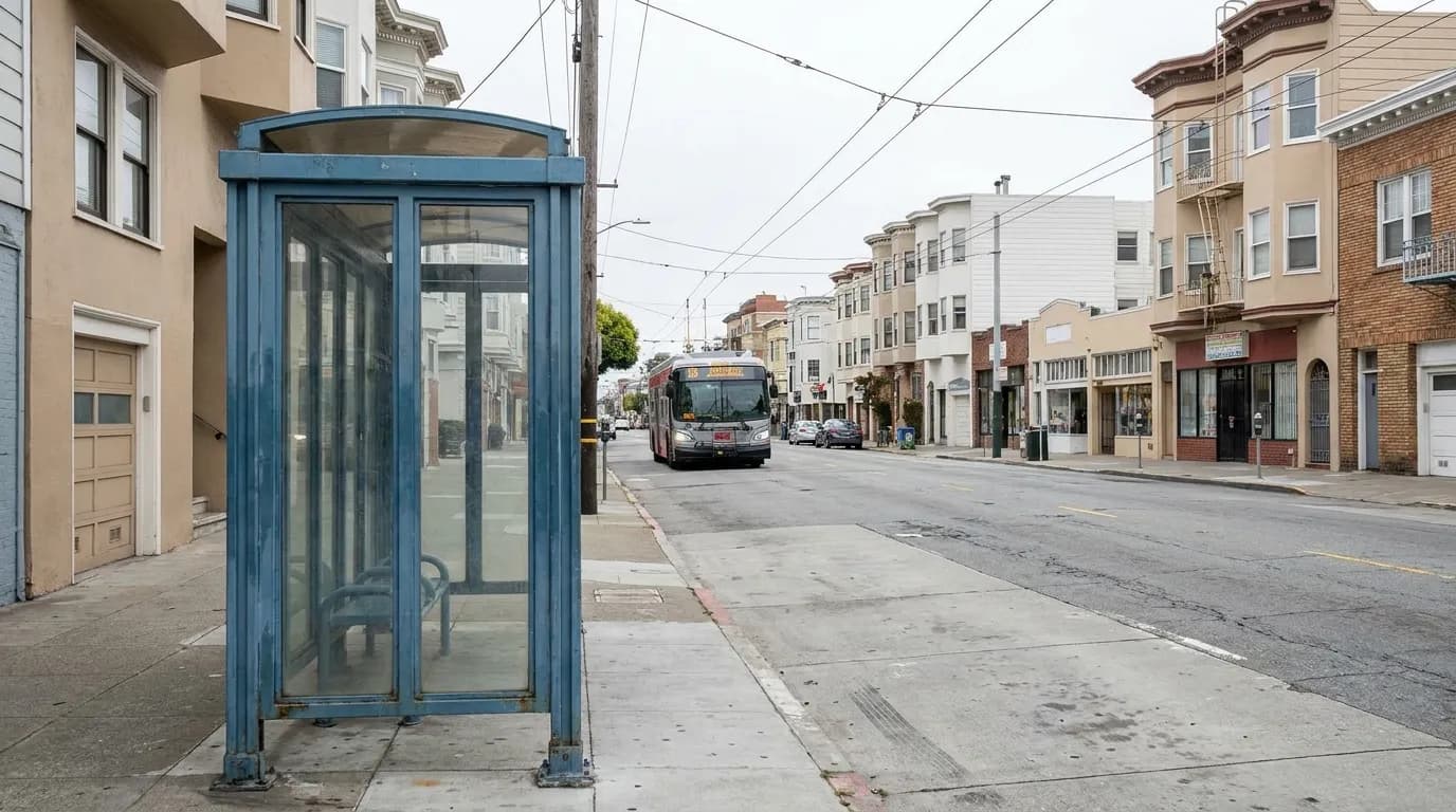 Muni bus approaching a stop on Clement Street in San Francisco's Inner Richmond neighborhood