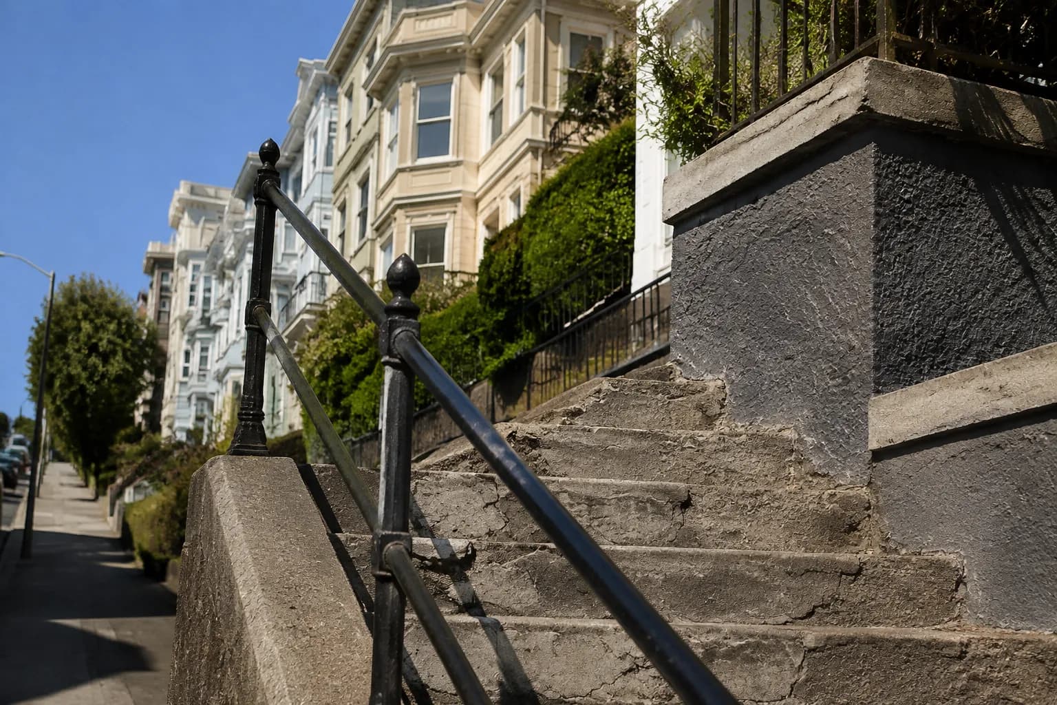 Steep hill and steps leading up to Dolores Park in San Francisco showing residential climb