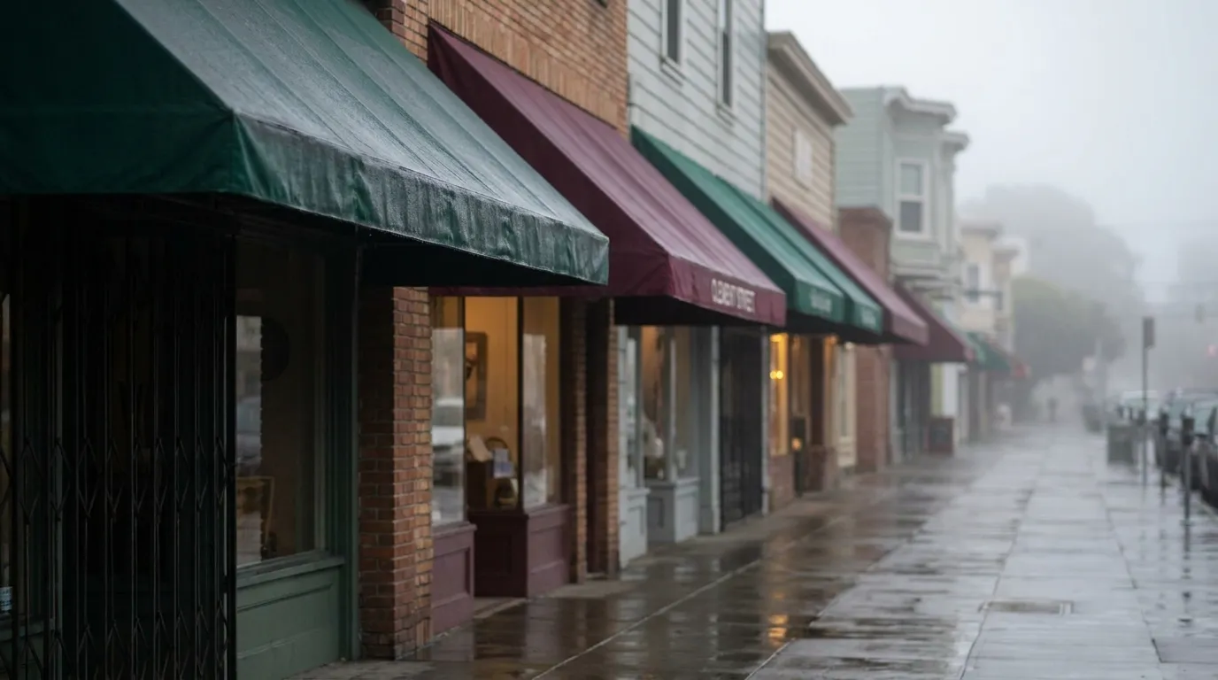 Covered awnings and storefronts on Clement Street in San Francisco's Richmond District