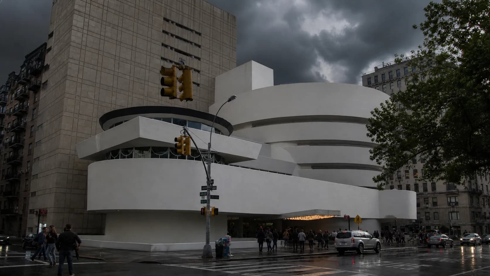 Dark thunderstorm clouds gather over the New York City skyline.