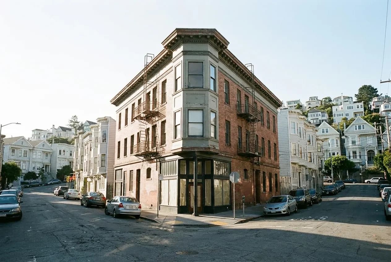 A wedge-shaped corner building where two avenues meet in San Francisco's North Beach