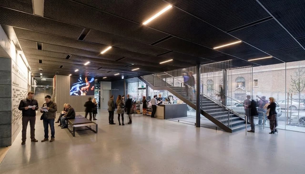 A polished lobby counter inside SFJAZZ Center before a performance