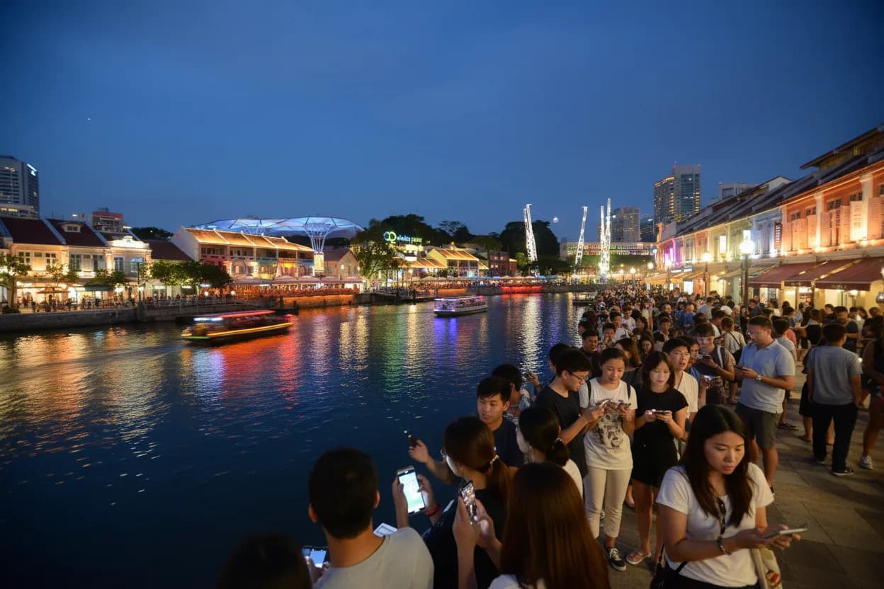 Clarke Quay evening start for a Singapore Portugal vs Spain route
