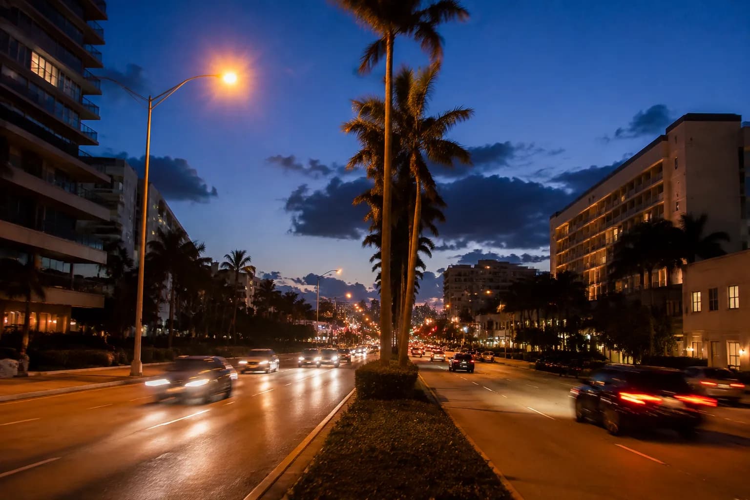 Biscayne Boulevard in downtown Miami at twilight with traffic and streetlights